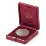 Italian Aperire Terram Gentivus silver medallion housed in a silk and velvel lined fitted case,