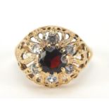 9ct gold garnet and white sapphire ring with pierced setting, size N, 4.0g : For Further Condition