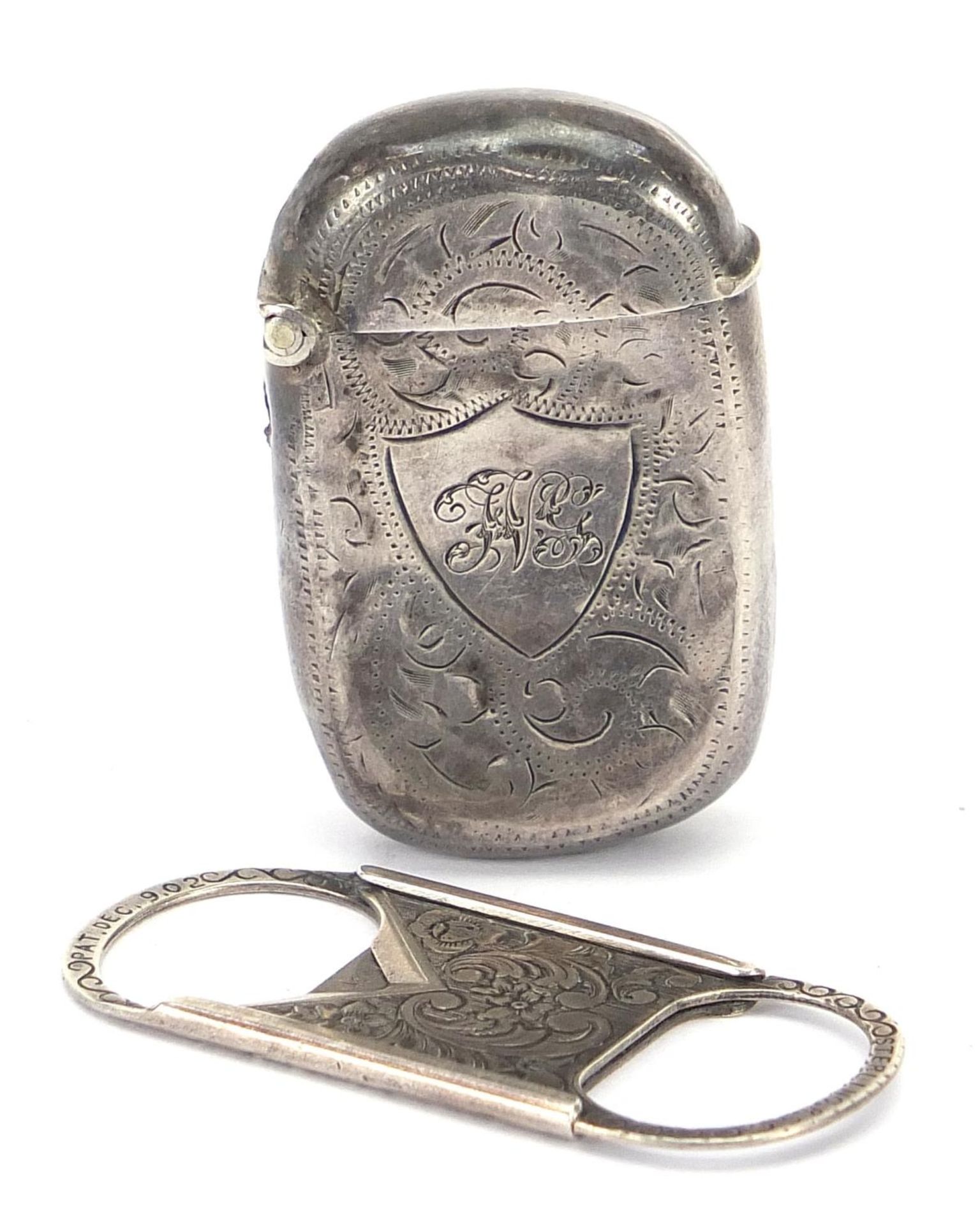 Edwardian silver vesta and sterling silver cigar cutter, the vesta hallmarked Birmingham 1909, the