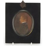 Victorian oval hand painted portrait miniature of a young gentleman housed in an ebonised frame, 7cm