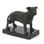 Patinated bronze study of a Staffordshire Bull Terrier raised on a faux marble base, 14cm in