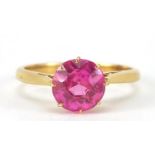 18ct gold ruby solitaire ring, the stone approximately 8mm in diameter, size N, 3.7g : For Further