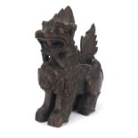 Burmese carved hardwood dragon, 30.5cm high : For Further Condition Reports Please Visit Our Website