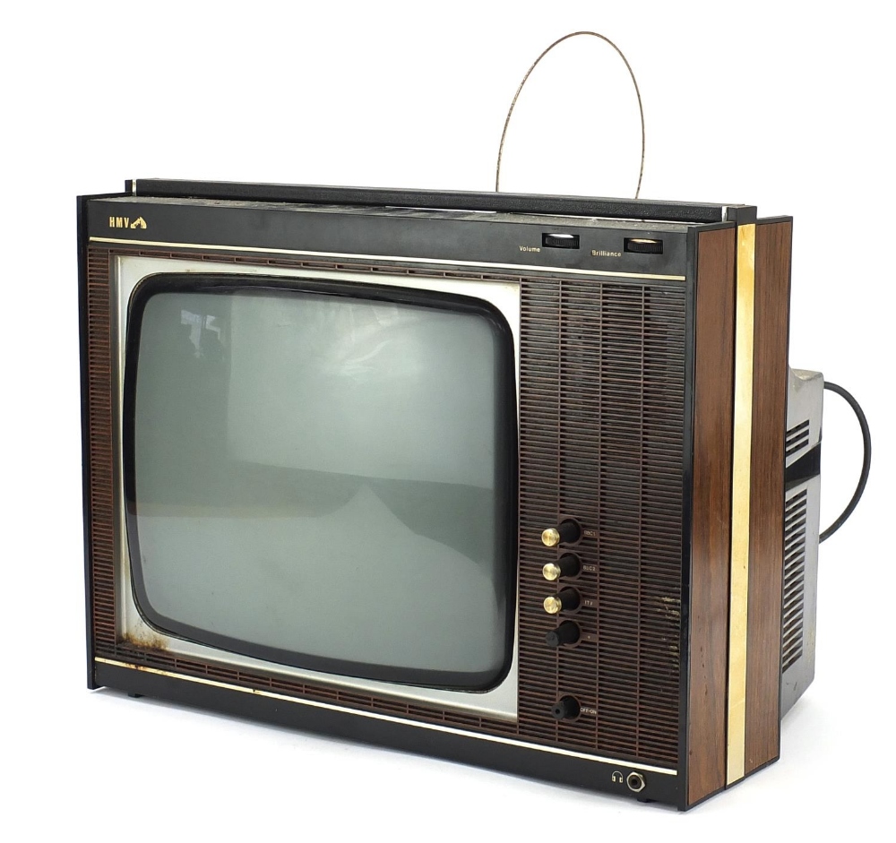 Vintage HMV portable TV model 2818B, sold as seen : For Further Condition Reports Please Visit Our