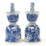 Chinese blue and white porcelain candle holders hand painted with birds amongst flowers, each 21cm