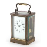 Large brass cased carriage clock striking on a gong, with enamel dial and Roman numerals, 12.5cm