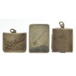 Three Victorian and later silver stamp cases and a trumps marker, various hallmarks, the largest 3.