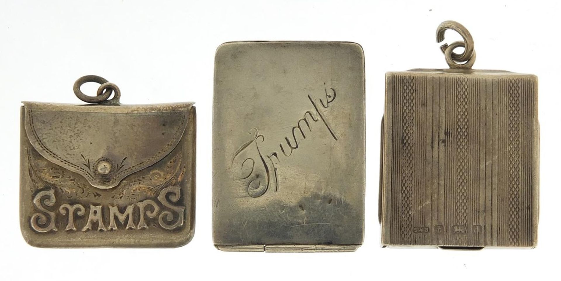 Three Victorian and later silver stamp cases and a trumps marker, various hallmarks, the largest 3.