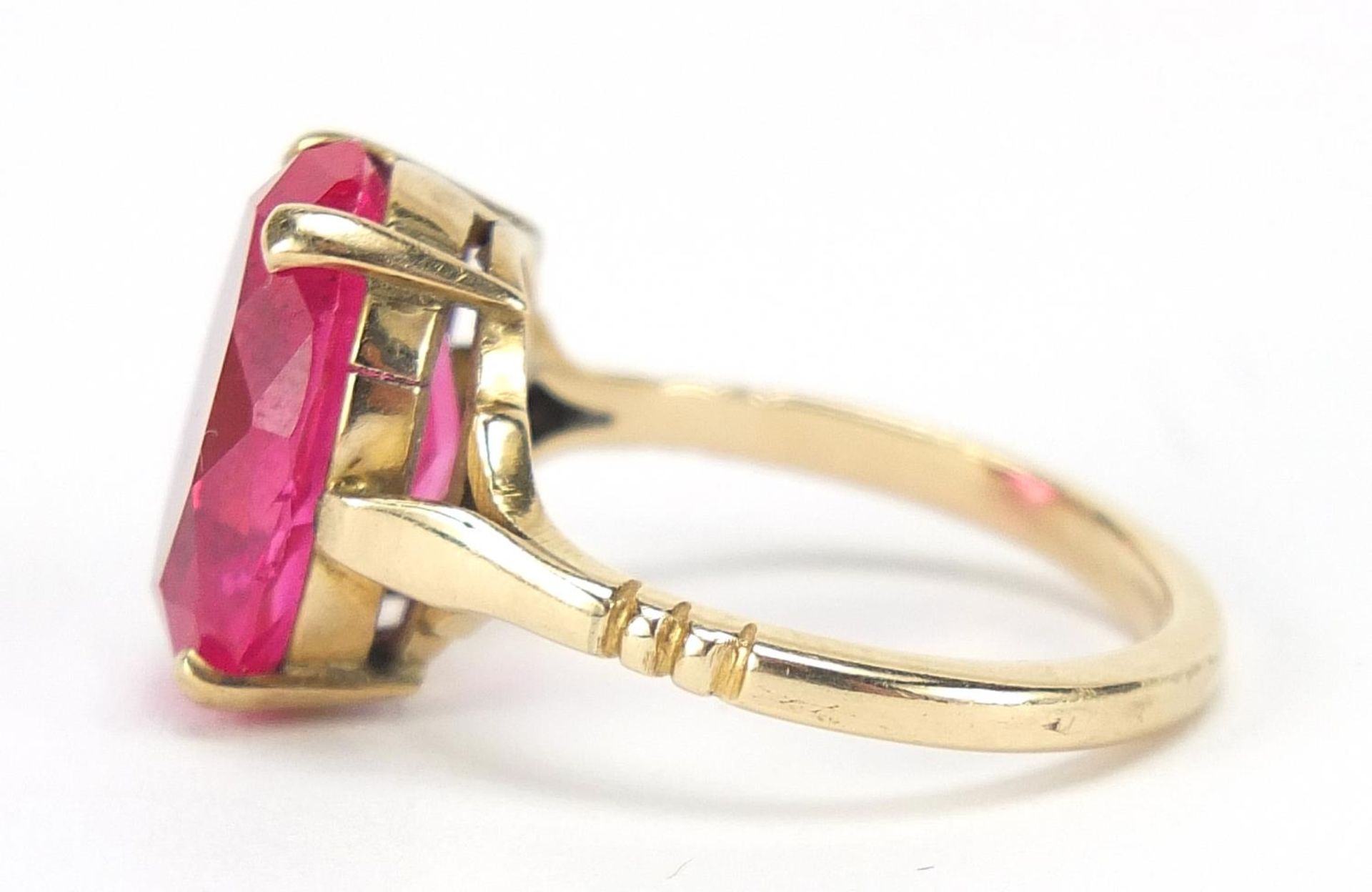 Unmarked gold ruby solitaire ring, the stone approximately 14.5mm x 10mm x approximately 6mm deep, - Image 2 of 4