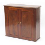 Oak and mahogany two door cupboard enclosing three shelves, 91cm H x 99cm W x 34cm D : For Further