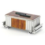 Art Deco design simulated tortoiseshell and chromed musical jewellery box with mirrored lift up top,