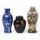 Two Chinese porcelain baluster vases and a lacquered tea caddy with cover decorated with goldfish,
