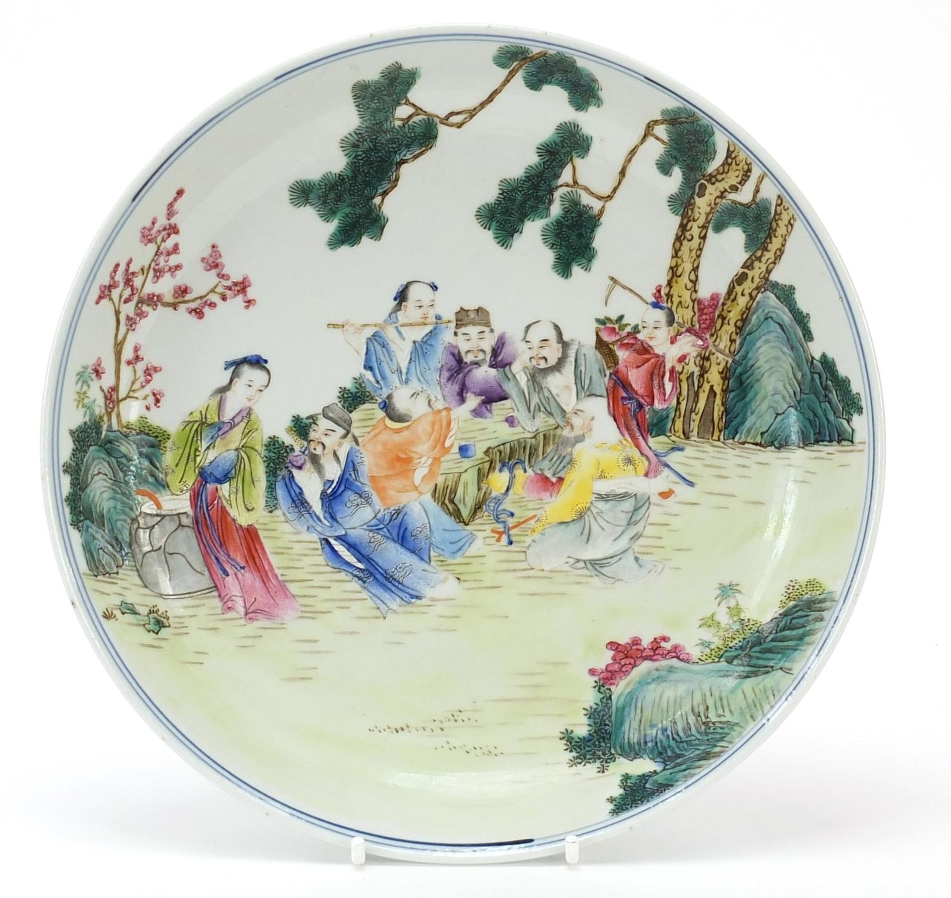 Chinese porcelain shallow dish finely hand painted in the famille rose palette with an Emperor and