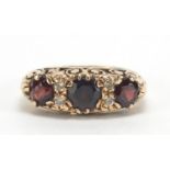 9ct gold garnet and white sapphire ring, size K, 3.9g : For Further Condition Reports Please Visit