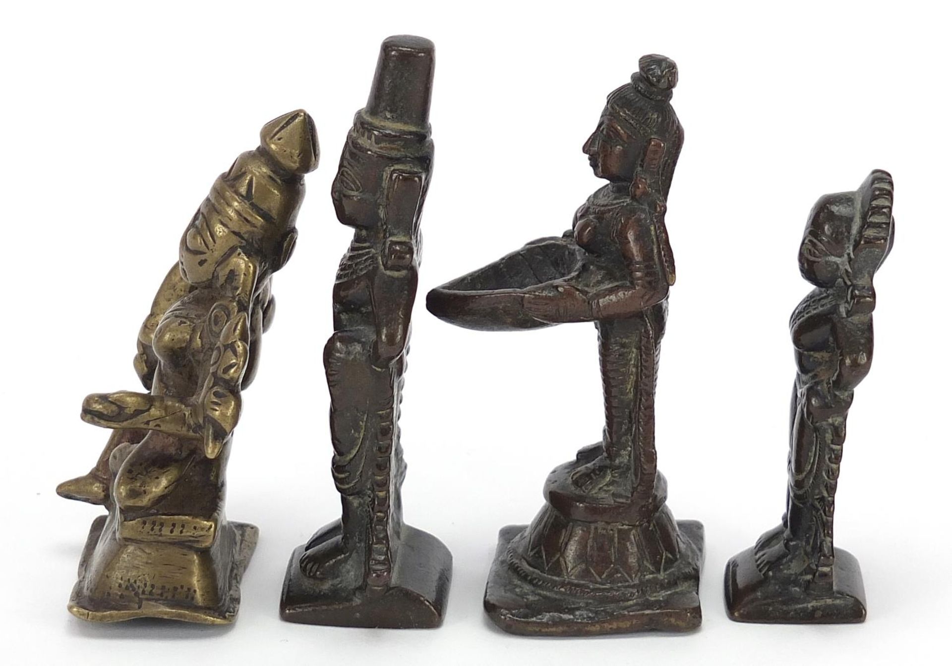 Four Indian patinated bronze votive figures, the largest 10cm high : For Further Condition Reports - Image 4 of 8