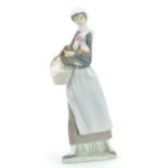 Lladro figurine of a female holding a cockerel and a basket, 24.5cm high : For Further Condition