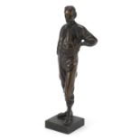 Early 20th century patinated bronze figure of Robert Louis Stevenson, impressed copyright to the
