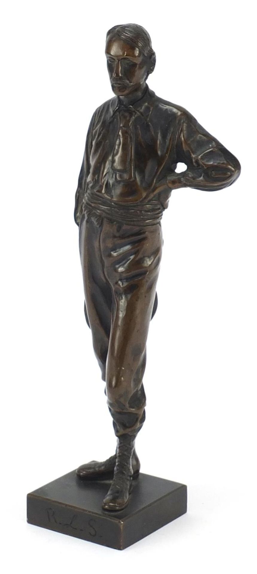 Early 20th century patinated bronze figure of Robert Louis Stevenson, impressed copyright to the