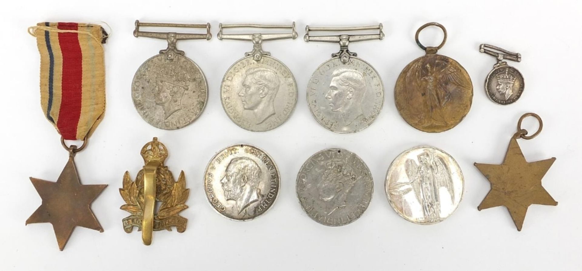 British militaria including four World War II medals, Intelligence Corps cap badge, Elizabeth II - Image 4 of 9