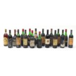 Eighteen vintage bottles of red wine, most with remnants of paper labels : For Further Condition