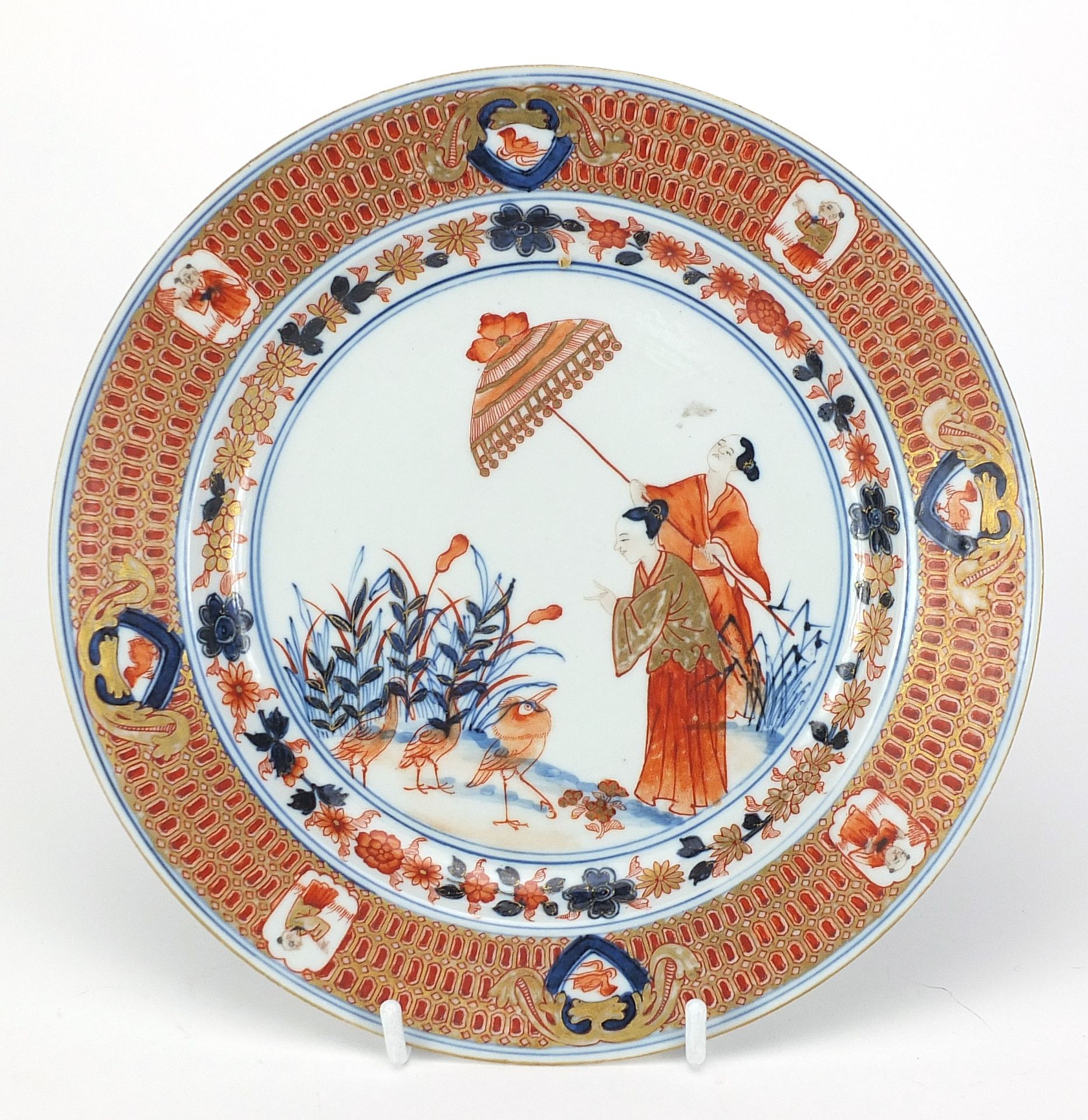 Chinese porcelain plate hand painted in the Imari pattern with two figures and cranes, 23cm in