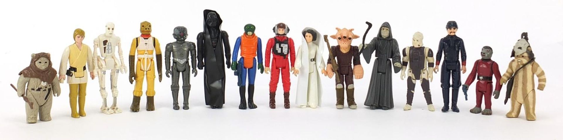 Fifteen vintage Star Wars action figures with accessories including Walrus man, Darth Vader, Luke