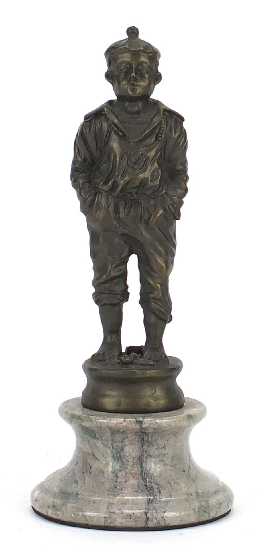 Patinated bronzed figure of a young sailor raised on a circular marble base, 24cm high : For Further