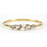 9ct gold pearl and diamond hinged bangle, 6.5cm wide, 7.0g : For Further Condition Reports Please