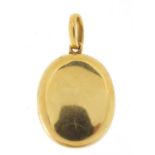 18ct gold oval locket, 3.5cm high, 8.2g : For Further Condition Reports Please Visit Our Website -