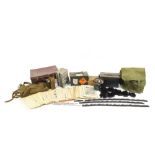 Militaria including ammunition tins, trench art shell case engraved with a dragon and gas mask : For