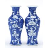 Pair of Chinese blue and white porcelain baluster vases hand painted with prunus flowers, blue