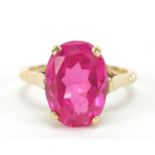 Unmarked gold ruby solitaire ring, the stone approximately 14.5mm x 10mm x approximately 6mm deep,