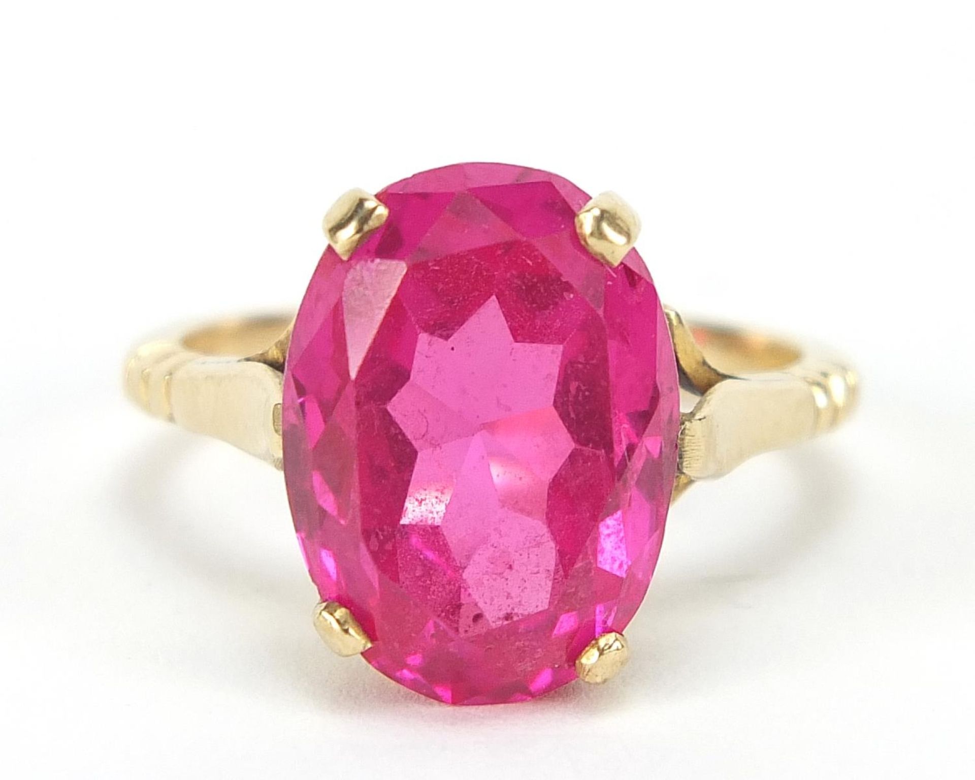 Unmarked gold ruby solitaire ring, the stone approximately 14.5mm x 10mm x approximately 6mm deep,