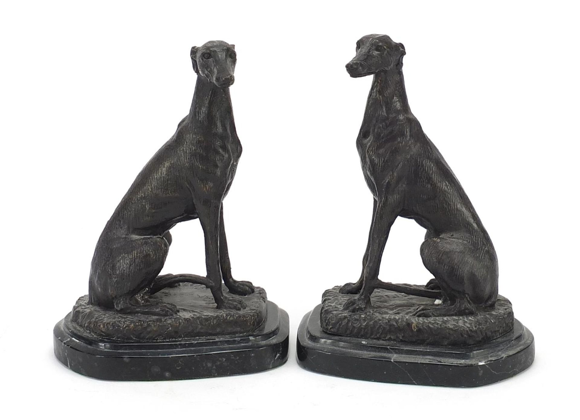 Patinated bronze greyhounds raised on shaped marble bases signed Barrie, each 20cm high : For