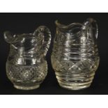 Two Georgian cut glass jugs, the largest 19cm high : For Further Condition Reports Please Visit