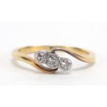 18ct gold diamond three stone crossover ring, size L, 2.3g : For Further Condition Reports Please