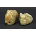 Two Chinese celadon jade carvings including one of two ducks, the largest 4.5cm in length : For