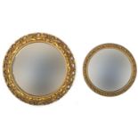 Two circular gilt framed convex wall mirrors, the largest 46cm in diameter : For Further Condition