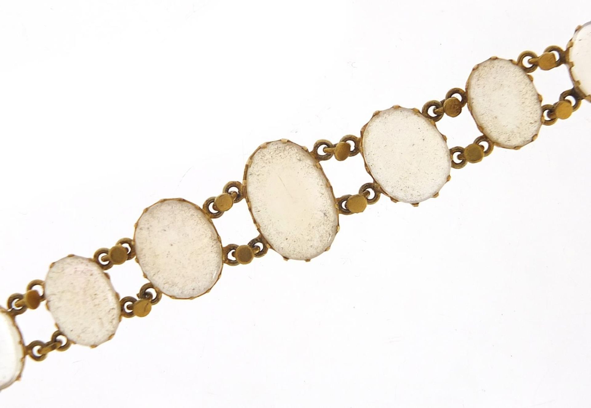 Antique unmarked gold graduated cabochon moonstone bracelet, 13cm in length, 7.6g : For Further