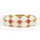 9ct gold opal and ruby ring, size R, 2.6g : For Further Condition Reports Please Visit Our Website -