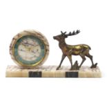 Art Deco marble stag design mantle clock with circular dial and chapter ring having Arabic numerals,