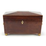 Victorian mahogany sarcophagus shaped tea caddy with ring turned lion head handles and fitted