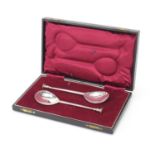 Haseler Brothers, pair of George V silver seal top spoons housed in a velvet and silk lined fitted