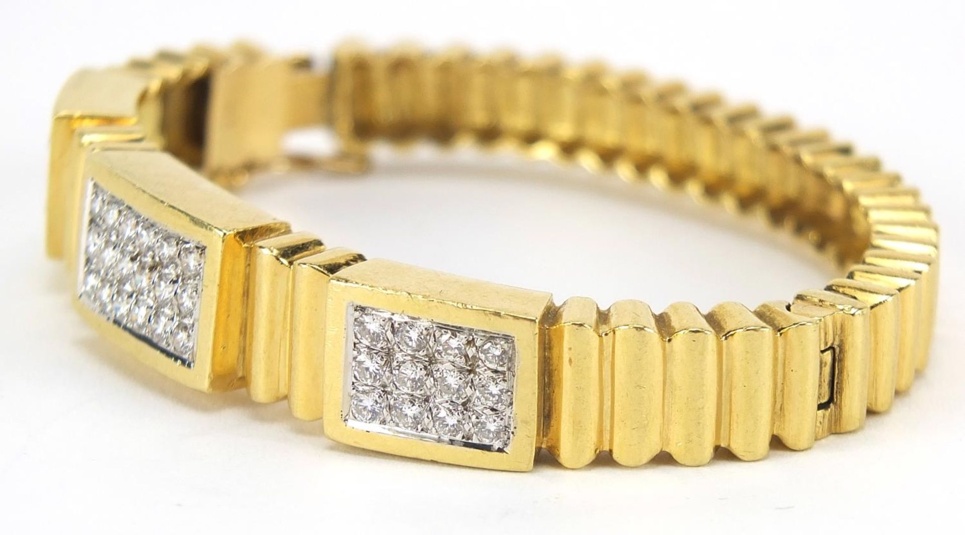 18ct gold diamond cluster hinged bangle, set with forty two diamonds the diamonds approximately 2. - Image 5 of 7