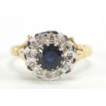 18ct gold sapphire and diamond ring, the sapphire approximately 5.0mm in diameter, size Q, 5.3g :