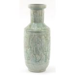 Large Chinese porcelain vase having a celadon glaze, decorated in relief with monks, 62cm high : For