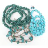 Middle Eastern turquoise matrix jewellery including three necklaces, the largest 78cm in length :