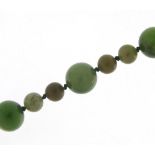 Green jade bead necklace, 64cm in length, 56.8g : For Further Condition Reports Please Visit Our