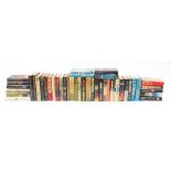 Hardback books including examples by Thomas Warren Adler, Len Dayton, Tom Clancy, Bernard Cornwell