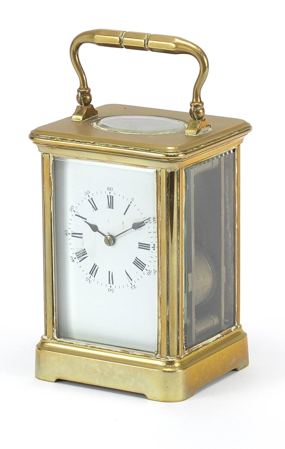 19th century brass cased carriage alarm clock with enamel dial having Roman and Arabic numerals,